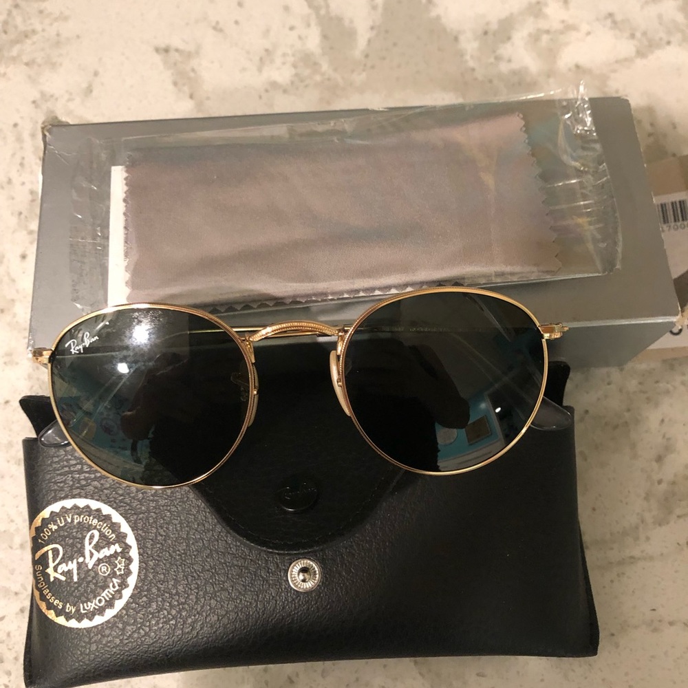 New with box Ray Ban sunglasses.